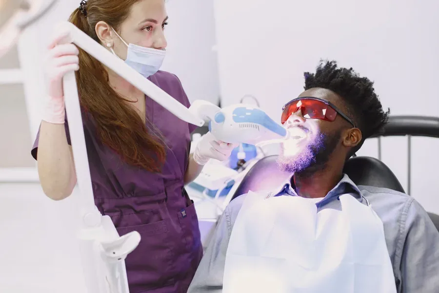 Shade guide used to check tooth colour during a teeth whitening session